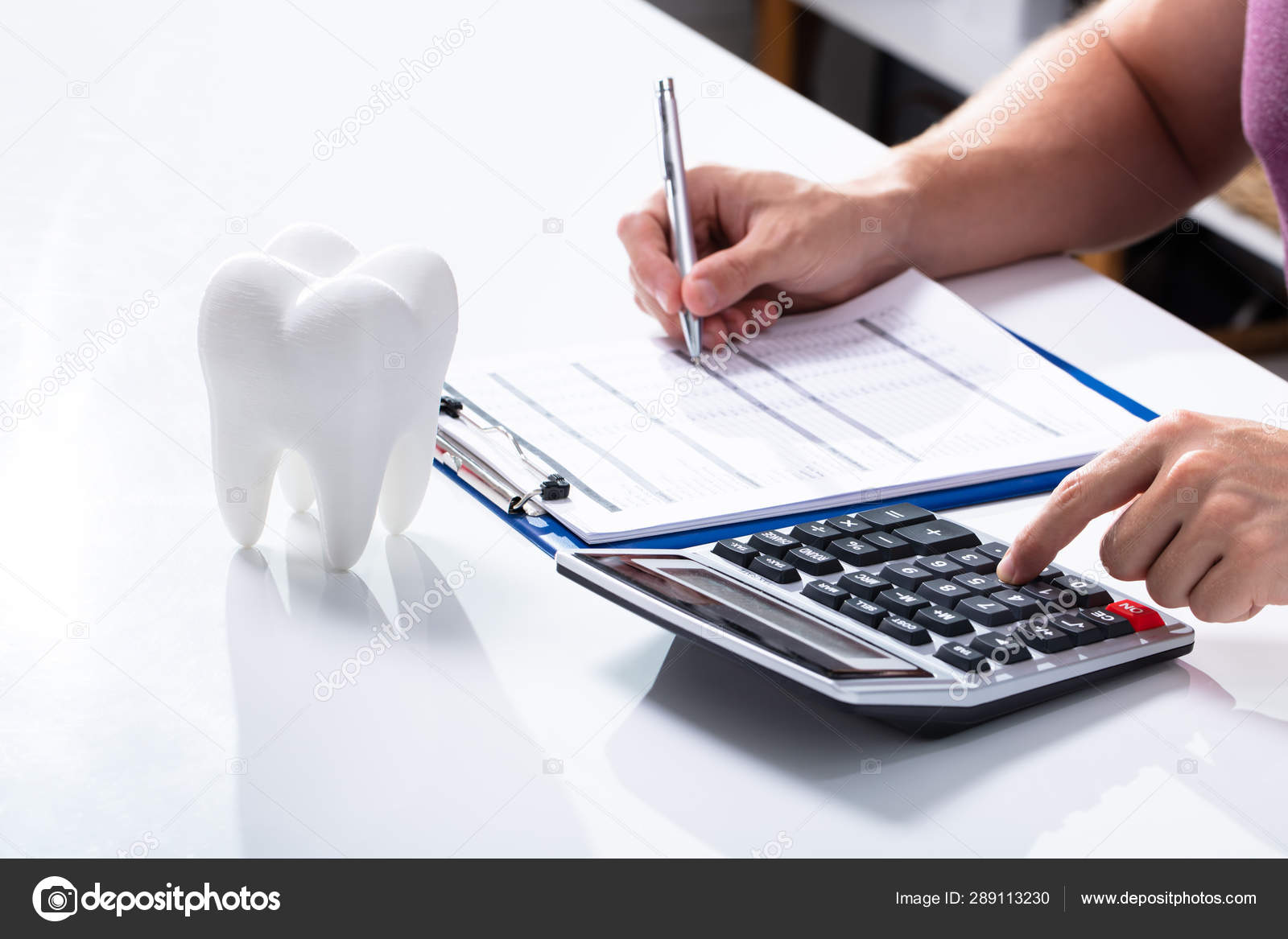 depositphotos_289113230-stock-photo-close-white-tooth-desk-front